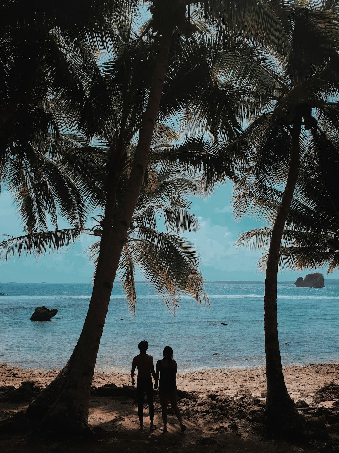 retired couple on tropical beach