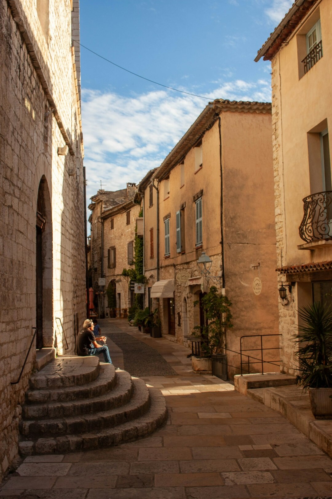 senior couple walking in quiet village