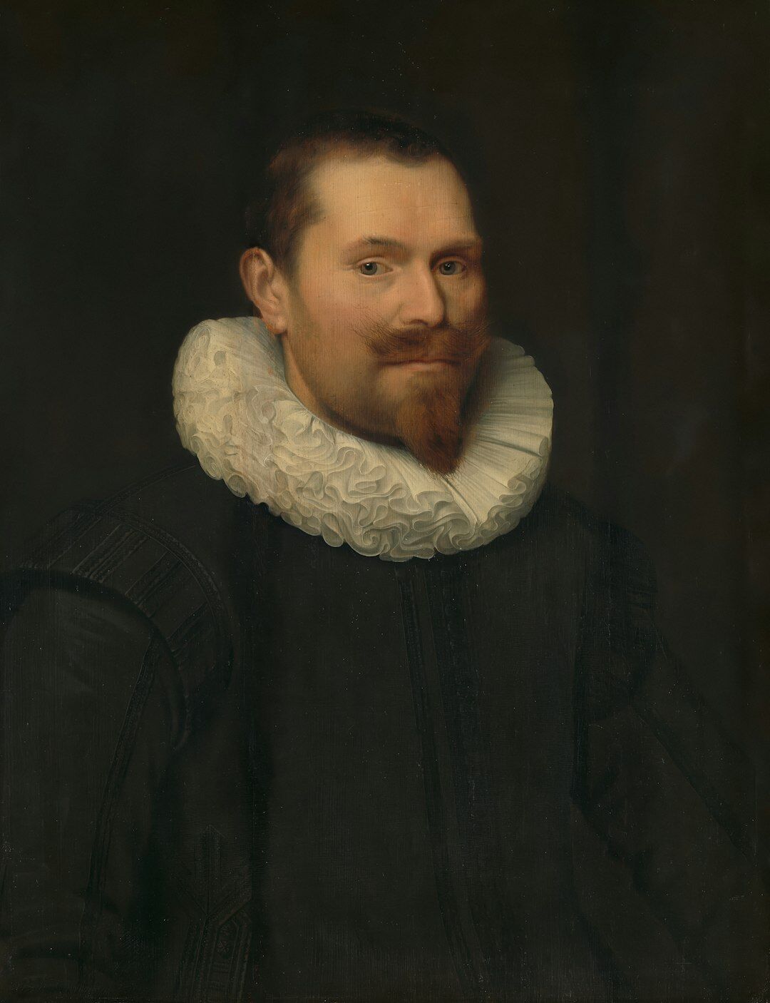 Studio portrait of a Dutch man in his thirties with a beard